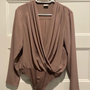 Babaton size medium bodysuit. Worn twice.